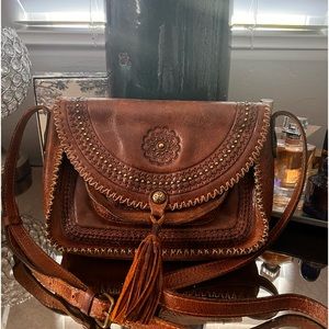 Distressed brown leather Patricia Nash crossbody.